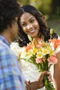 Woman getting flowers. Royalty Free Stock Photo