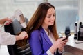 The woman getting her hair done in beauty shop Royalty Free Stock Photo