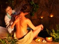 Woman getting massage in luxury spa. Royalty Free Stock Photo