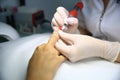 Woman getting nail manicure. Royalty Free Stock Photo