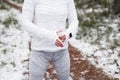 Woman getting ready for winter exercise outdoors Royalty Free Stock Photo
