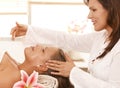 Woman getting relaxing head massage Royalty Free Stock Photo