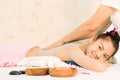 Woman is getting salt scrub on her back in Spa Royalty Free Stock Photo