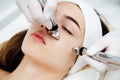 Woman getting ultrasound face beauty treatment in medical spa center Royalty Free Stock Photo