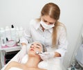 Woman getting ultrasound face beauty treatment in medical spa center Royalty Free Stock Photo