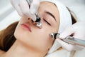 Woman getting ultrasound face beauty treatment in medical spa center Royalty Free Stock Photo