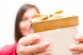 Woman with a gift box in hands Royalty Free Stock Photo