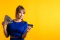 Woman girl with dollars and credit card Royalty Free Stock Photo