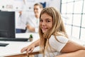 Woman and girl oculist and patient examining vision using snellen test at clinic Royalty Free Stock Photo