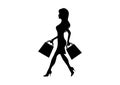 Silhouette woman holding shopping bags vector