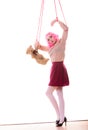 Woman girl stylized like marionette puppet on string Royalty Free Stock Photo