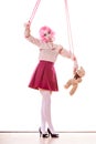 Woman girl stylized like marionette puppet on string Royalty Free Stock Photo