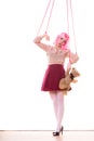 Woman girl stylized like marionette puppet on string Royalty Free Stock Photo