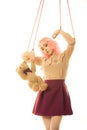 Woman girl stylized like marionette puppet on string Royalty Free Stock Photo