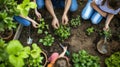 A woman and girls are planting plants in a garden AIG41 Royalty Free Stock Photo