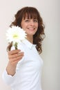 A woman give a flower Royalty Free Stock Photo