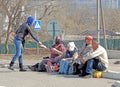 Woman gives alms at Easter