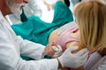 Woman giving birth in hospital with medical team Royalty Free Stock Photo