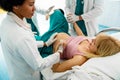 Woman giving birth in labor room of hospital Royalty Free Stock Photo