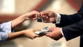 Woman giving bunch of dollars to real estate agent and receiving keys from home Royalty Free Stock Photo