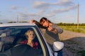 Woman giving directions to a female driver Royalty Free Stock Photo