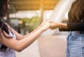 Woman giving hand to depressed friend,Psychiatrist holding hands patient,Meantal health care concept Royalty Free Stock Photo