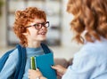 Mother preparing son for school studies Royalty Free Stock Photo