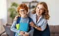 Mother preparing son for school studies Royalty Free Stock Photo