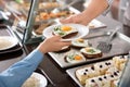 Woman giving plate with healthy food to boy in school canteen Royalty Free Stock Photo