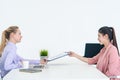 Woman Giving resume to officer for job interview Royalty Free Stock Photo