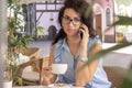 Woman in glass. Beautiful brunette Happy businesswoman calling on mobile phone Royalty Free Stock Photo