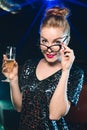 Woman with glass of champagne on new year or christmas party Royalty Free Stock Photo