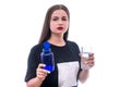 Woman with glass of water and pills in bottle isolated Royalty Free Stock Photo