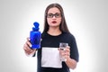 Woman with glass of water and pills in bottle isolated Royalty Free Stock Photo