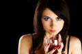 Woman with glass of wine.