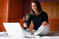 Woman with glass of wine having a romantic date online. Royalty Free Stock Photo