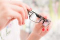 Woman with glasses in hands Royalty Free Stock Photo