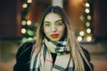 Woman with glasses look at camera poses in city center Beautiful hair attractive smile girl. Close up shot Woman with Royalty Free Stock Photo