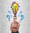 Woman in glasses showing light bulb, questions Royalty Free Stock Photo