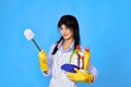 woman in gloves holding bucket of detergents Royalty Free Stock Photo