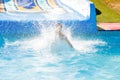 Woman going down a water slide Royalty Free Stock Photo