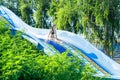 Woman going down a water slide Royalty Free Stock Photo