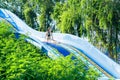 Woman going down a water slide Royalty Free Stock Photo