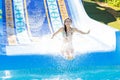 Woman going down a water slide Royalty Free Stock Photo