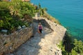 Woman Going Downstairs In Ulcinj Stari Grad, Montenegro