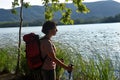 Woman going on excursion and contemplating the sunset Royalty Free Stock Photo