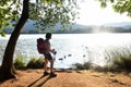 Woman going on excursion and contemplating the sunset Royalty Free Stock Photo