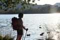 Woman going on excursion and contemplating the sunset Royalty Free Stock Photo