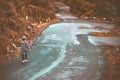 A woman going along with road in shimla, India