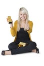 Woman with gold bars giving thumbs up Royalty Free Stock Photo